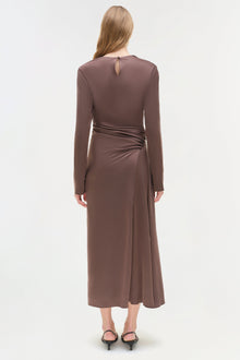 Brown satin midi dress with long sleeves, ruched waist detail, and keyhole back cutout on model.