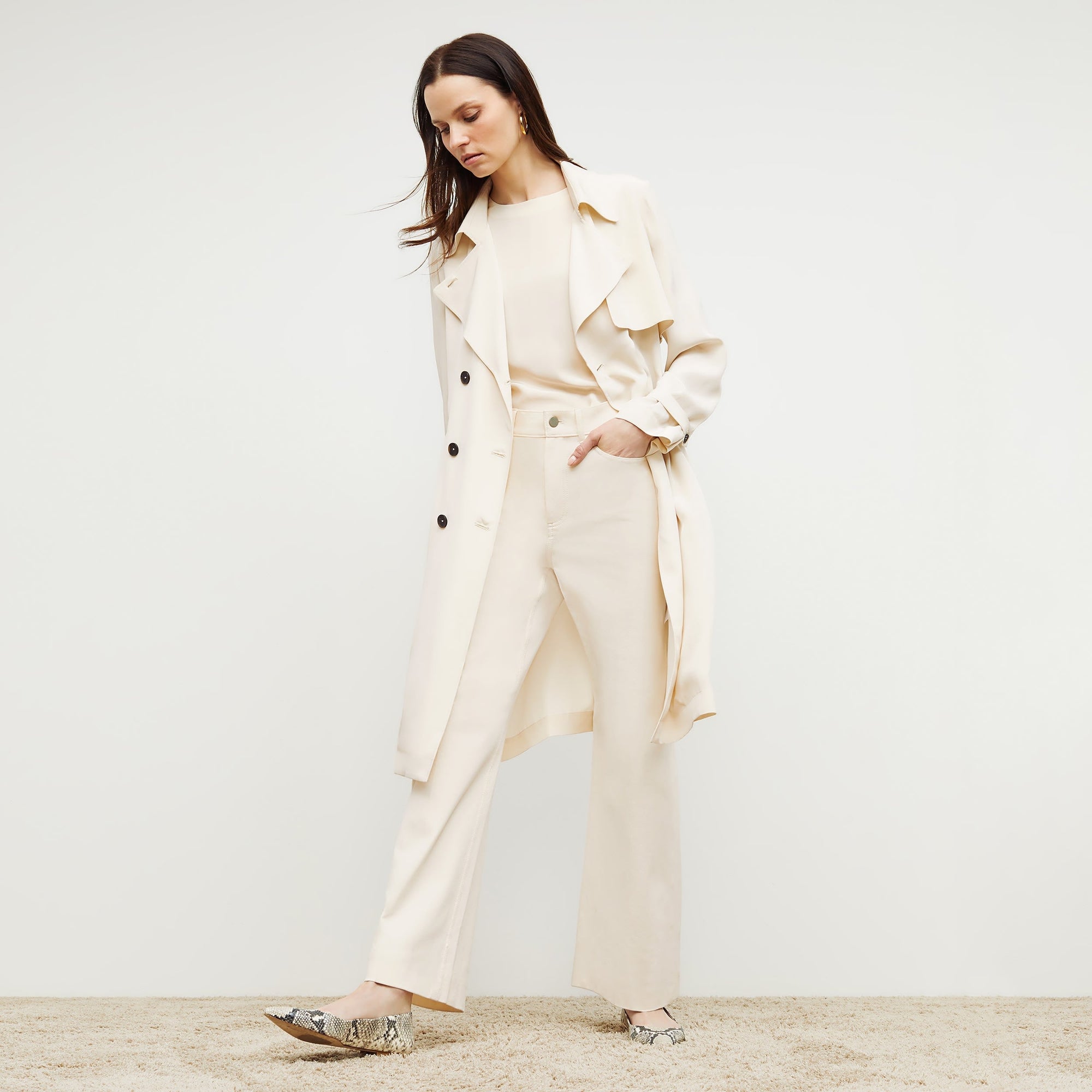 Front image of a woman standing wearing the milo jean in tusk | Exclude