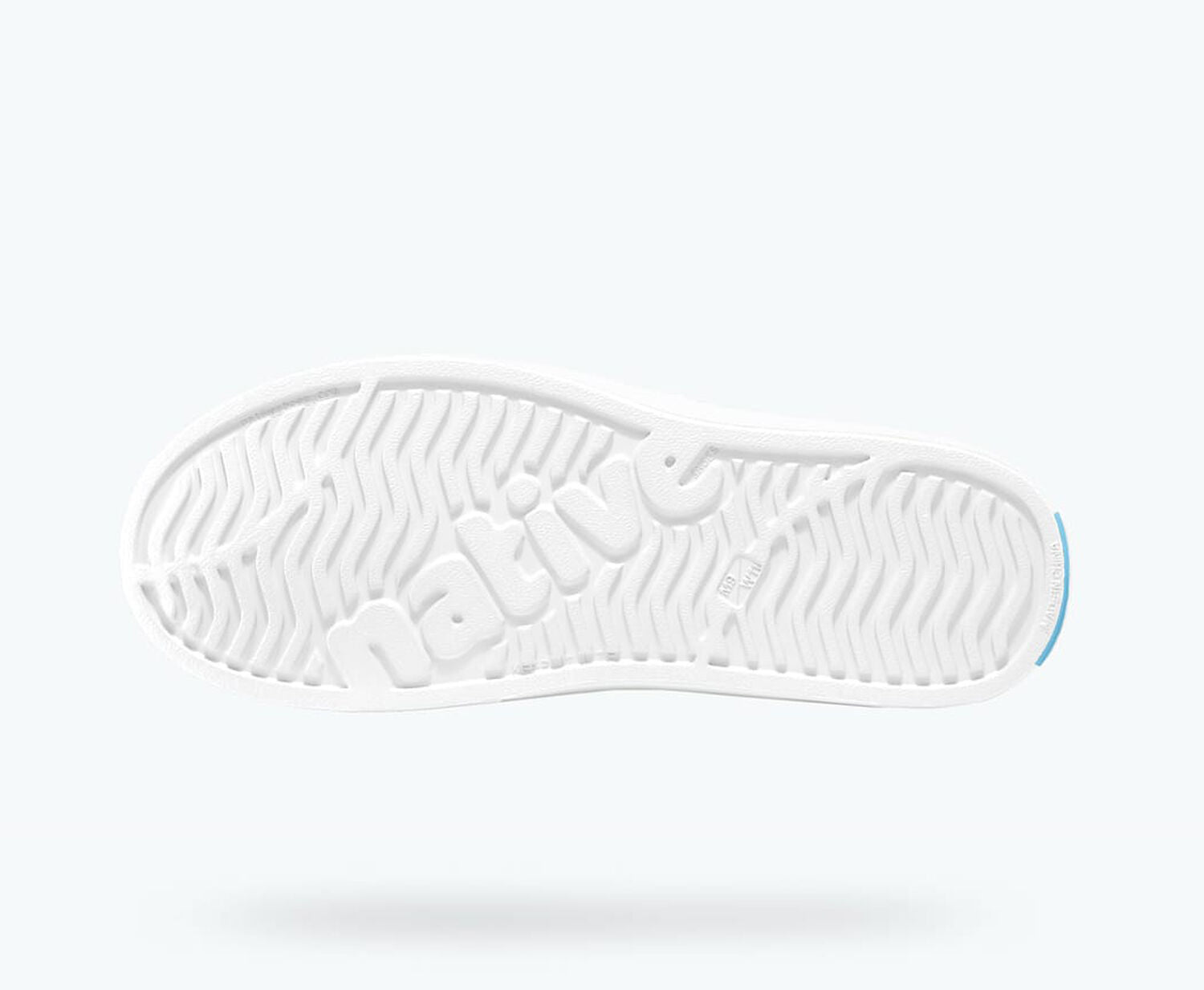 Bottom view of a Native Shoes Miles | Shell White/ Shell White Footwear