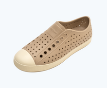 Angled view of a Native Shoes Jefferson | Flax Tan/ Bone White Footwear