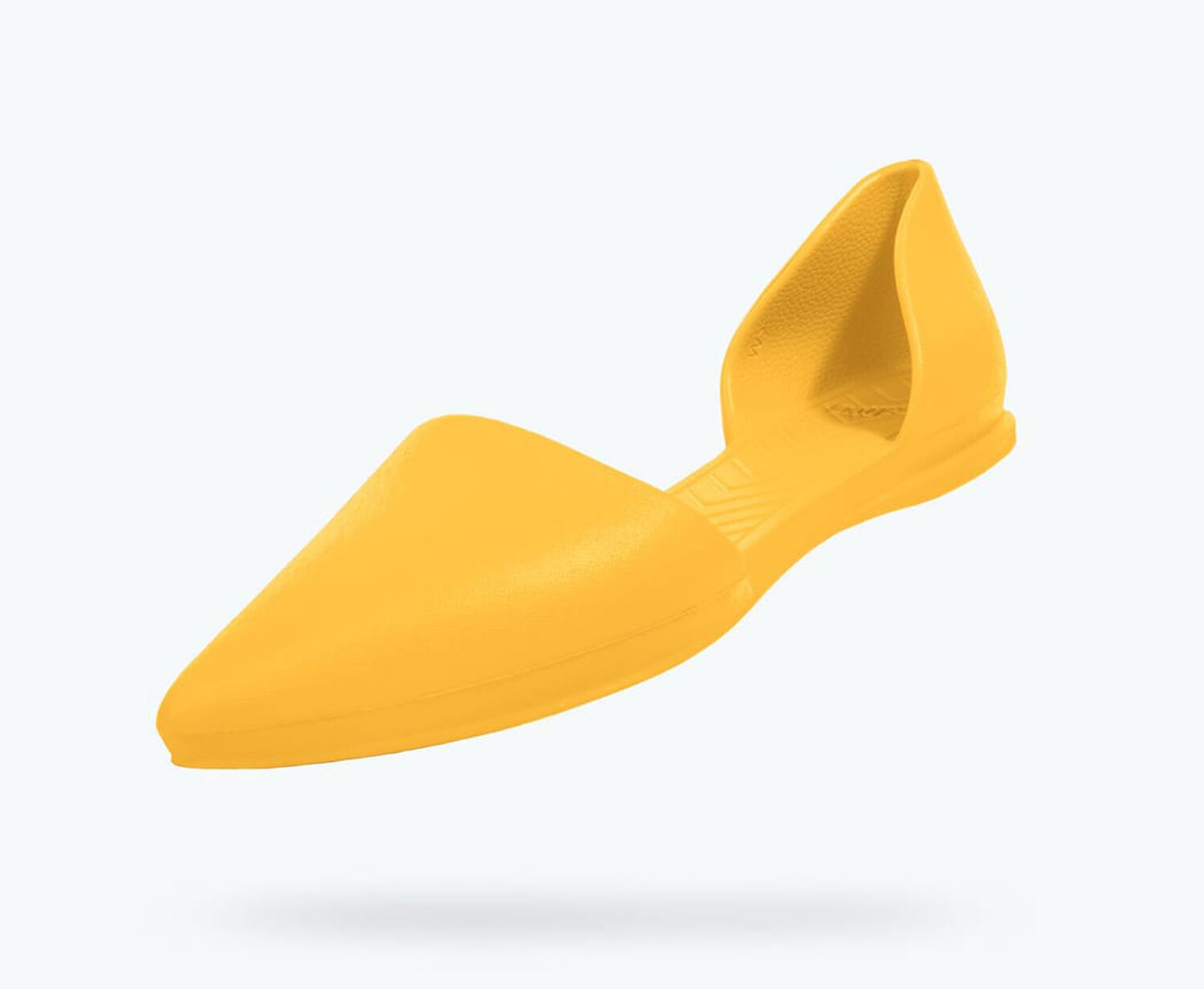Angled view of a Native Shoes Audrey | Groovy Yellow Footwear
