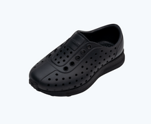 Angled view of a Native Shoes Kids Robbie Kids | Jiffy Black/ Jiffy Black/ Jiffy Speckle Rubber Footwear