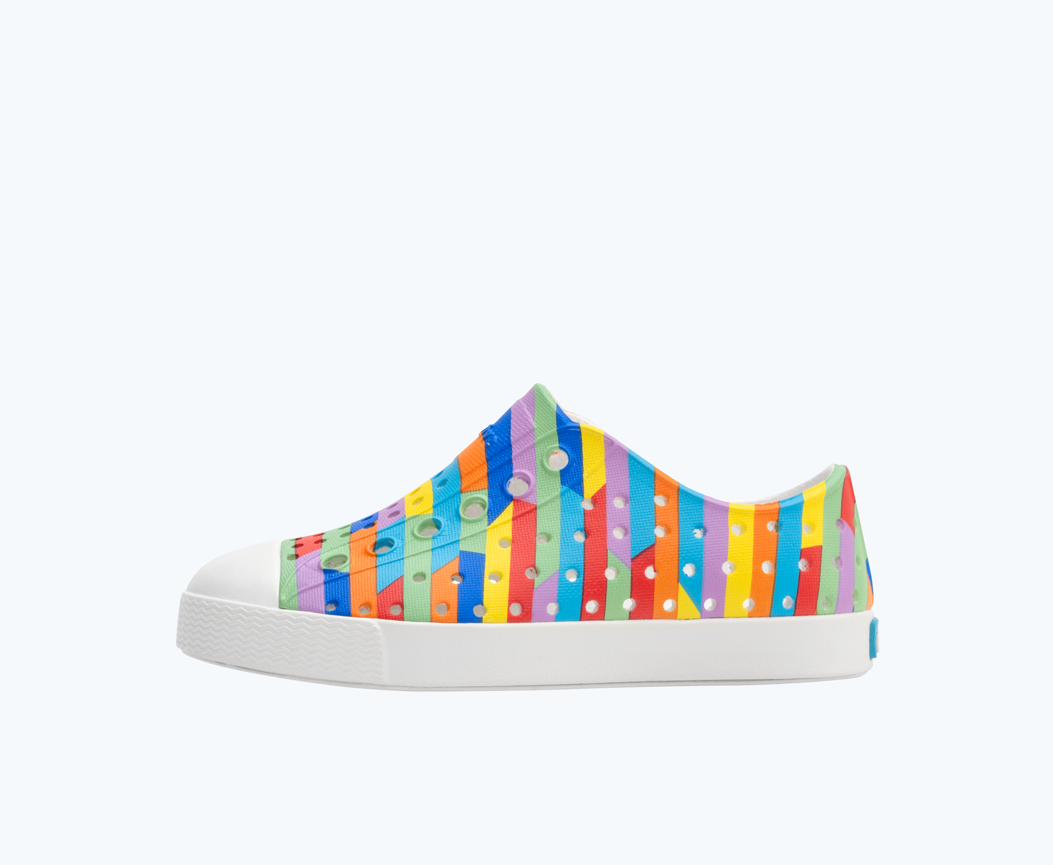 Side view of a Native Shoes Kids Jefferson Print Kids | Shell White/ Shell White/ Rainbow Multi Stripe 2 Footwear