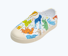 Angled view of a Native Shoes Kids Jefferson Print Kids | Shell White/ Bone White/ Candy Safari Friends Footwear