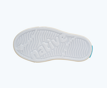 Bottom view of a Native Shoes Kids Jefferson Print Kids | Shell White/ Bone White/ Candy Safari Friends Footwear