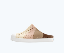 Side view of a Native Shoes Kids Jefferson Clog Marble Kids | Chameleon Flax Marble/ Shell White Footwear
