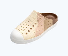 Angled view of a Native Shoes Kids Jefferson Clog Marble Kids | Chameleon Flax Marble/ Shell White Footwear
