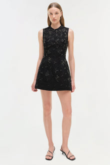 Black sleeveless lace mini dress with allover beaded embellishments and a fitted A-line silhouette.