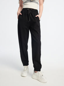 high-waisted tapered pants | Black