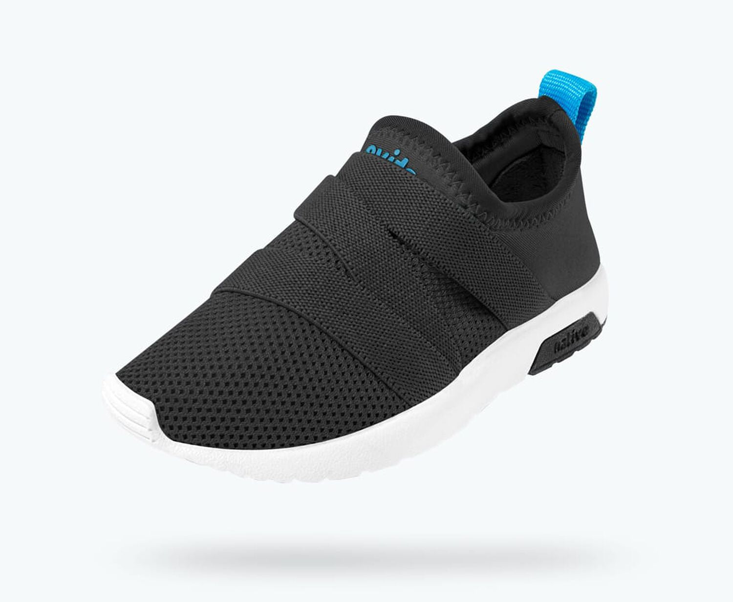 Angled view of a Native Shoes Kids Phoenix Kids | Jiffy Black/ Shell White Footwear