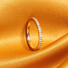 Flatlay Model. A close-up flatlay shot of a diamond eternity ring.