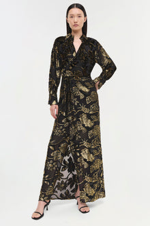 Black wrap gown with gold floral print, long sleeves, and maxi length with side slit.