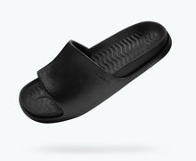 Angled view of a Native Shoes Spencer Lx | Jiffy Black/ Jiffy Black Footwear