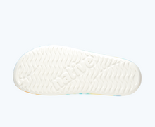 Bottom view of a Native Shoes Spencer Lx Print | Shell White/ Shell White/ Orange Tie Dye Footwear