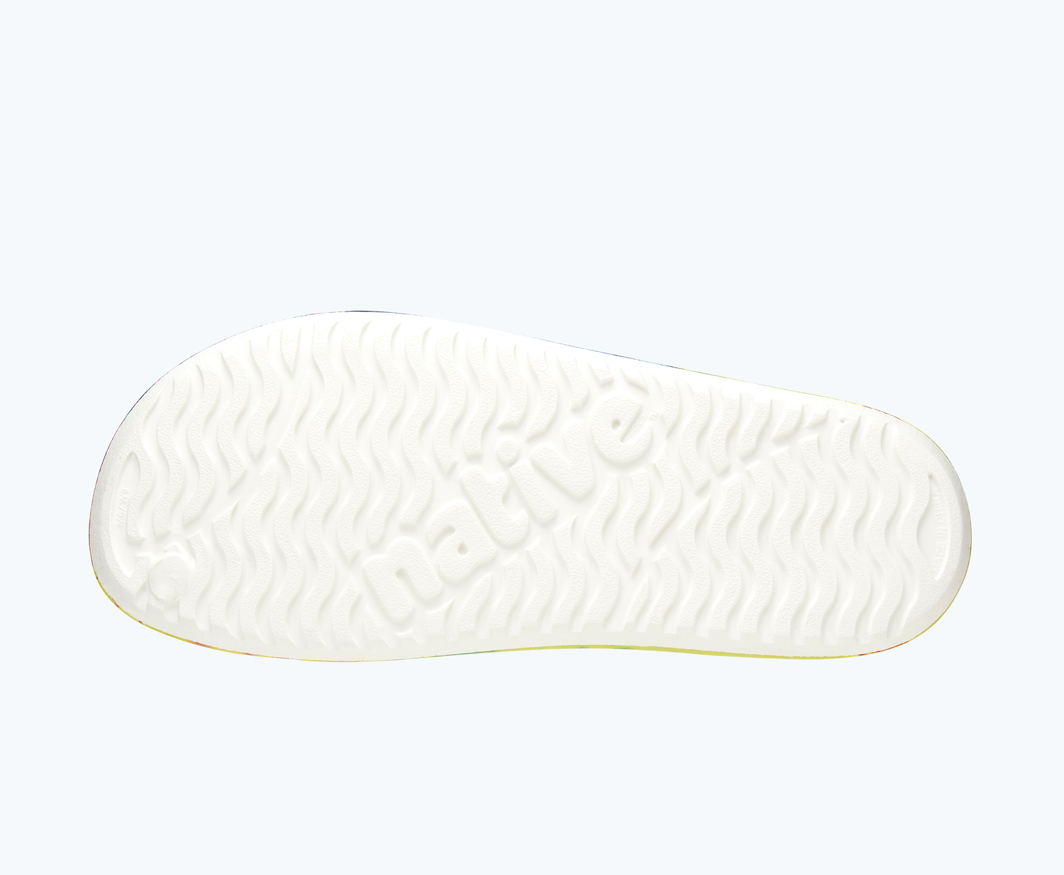 Bottom view of a Native Shoes Spencer Lx Print | Shell White/ Shell White/ Neon Multi Tie Dye Footwear