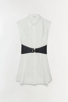 White sleeveless cotton mini dress with collared neckline and black buckled belt at waist.