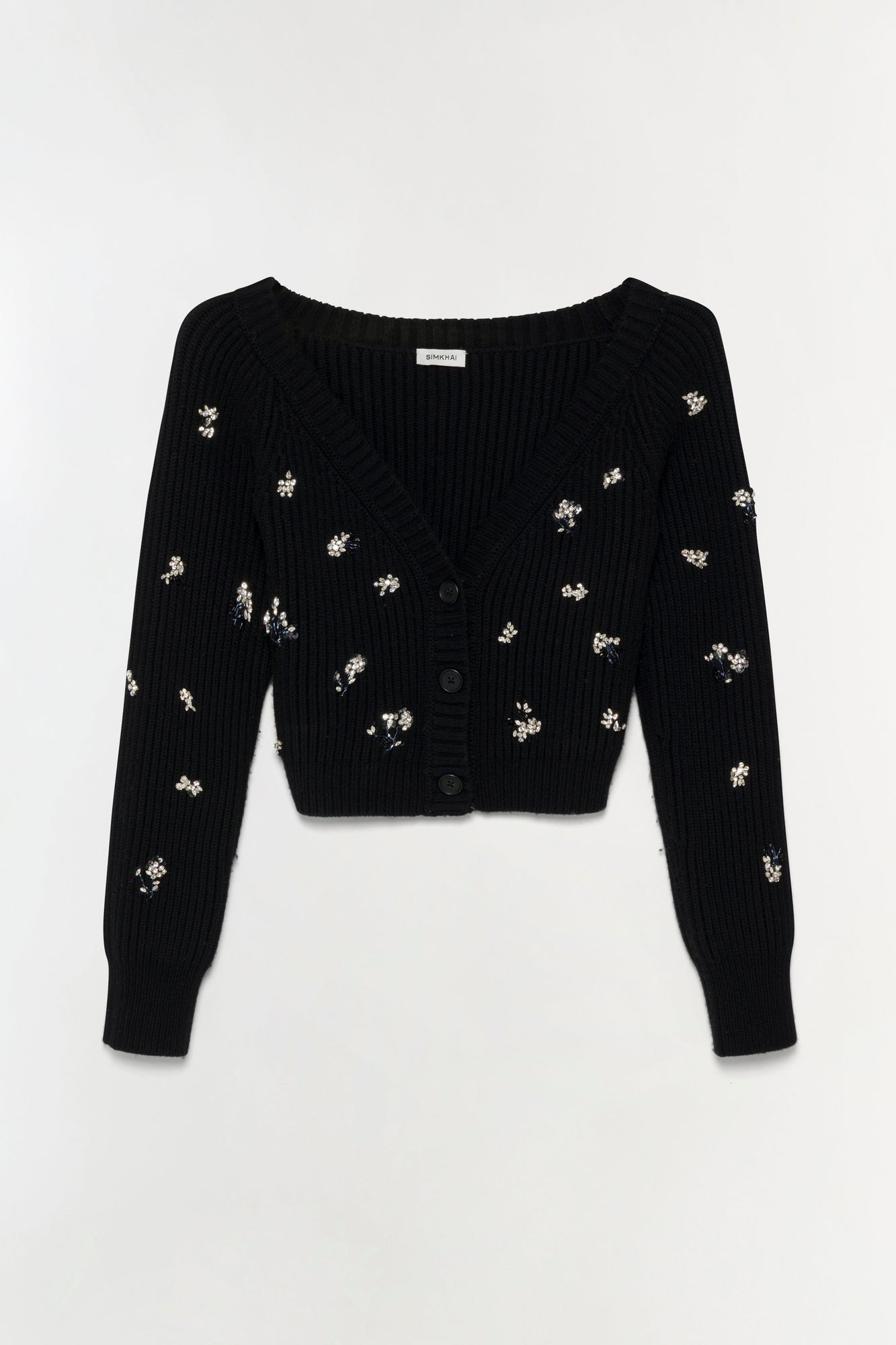 Black ribbed knit cardigan with scattered silver floral embellishments and black button front closure.