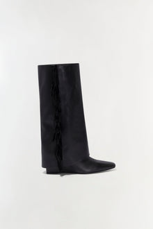 Black leather knee-high boot with fringe trim along the inner side seam.