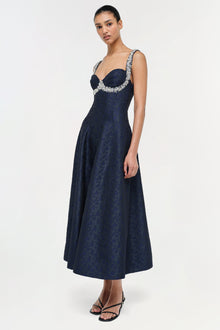 Navy jacquard midi dress with sweetheart neckline, embellished straps, and full A-line skirt.