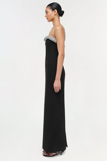 Black strapless floor-length gown with crystal beaded neckline detail, shown on model in profile view.