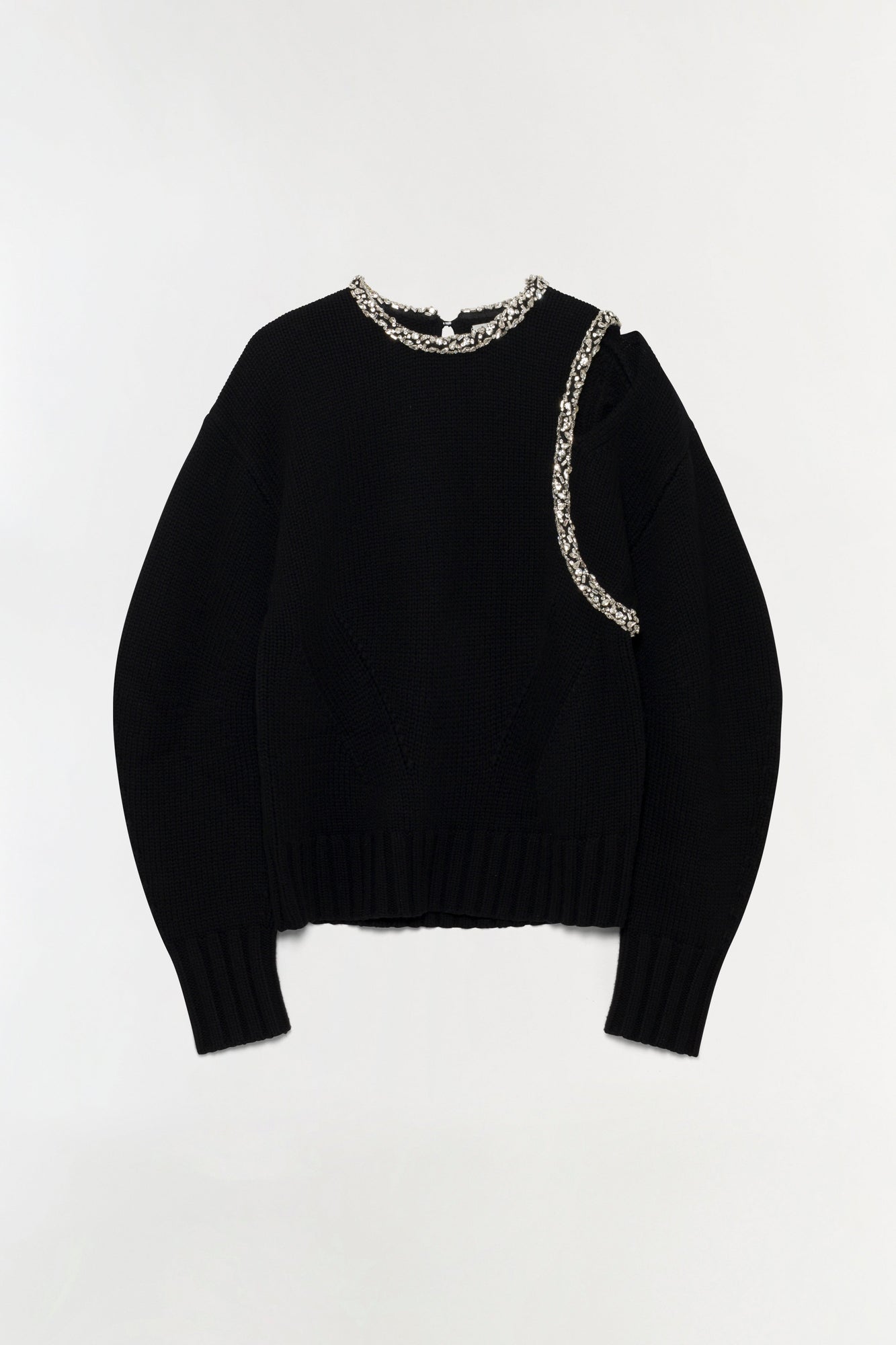 Black pullover with beaded trim around neckline and down right side.
