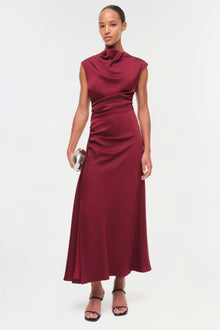 Burgundy satin midi dress with draped neckline, sleeveless design, and ruched side detailing.