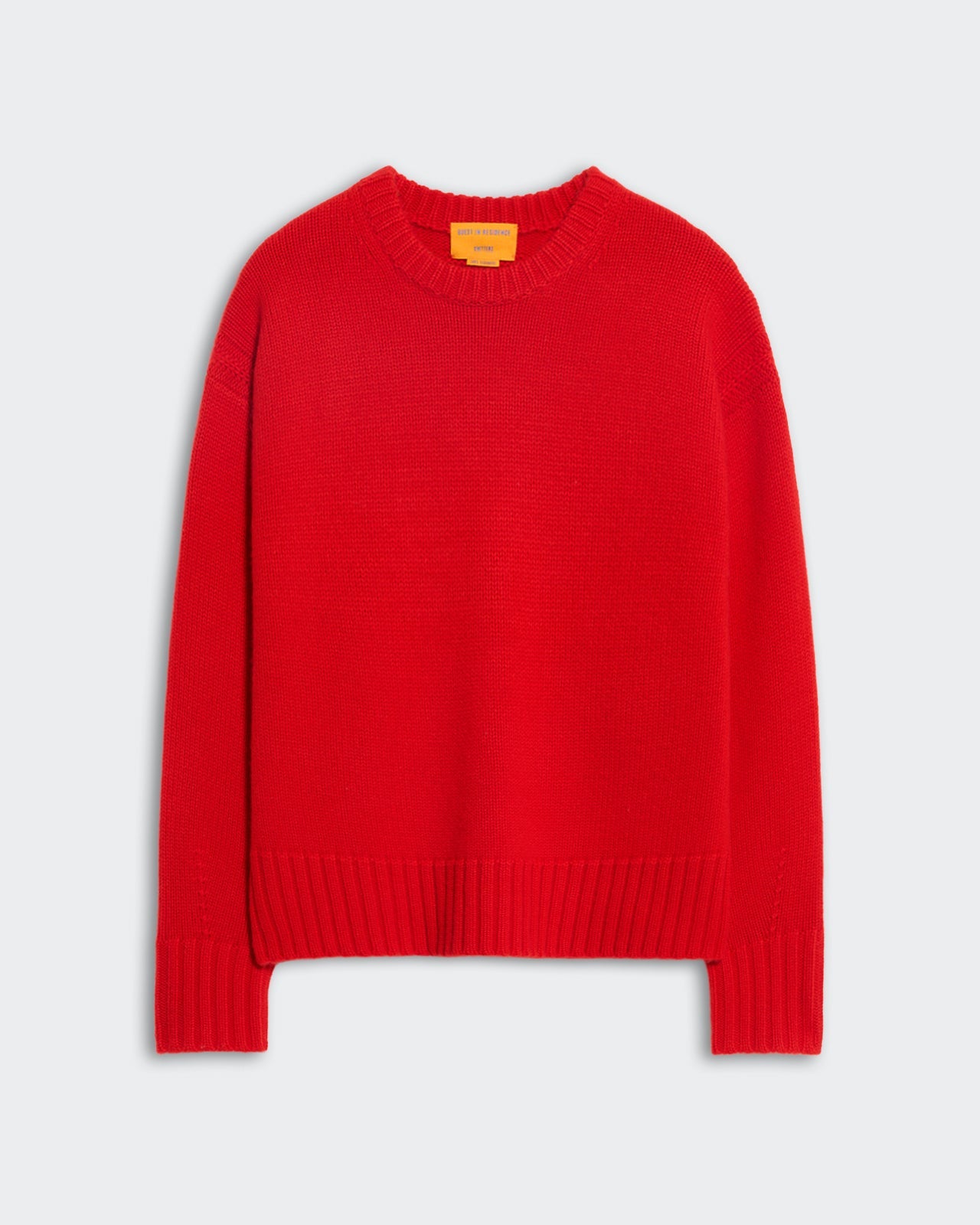 Bright red oversized women's crew neck sweater with ribbed trim and dropped shoulders, cozy and heavyweight knit design.