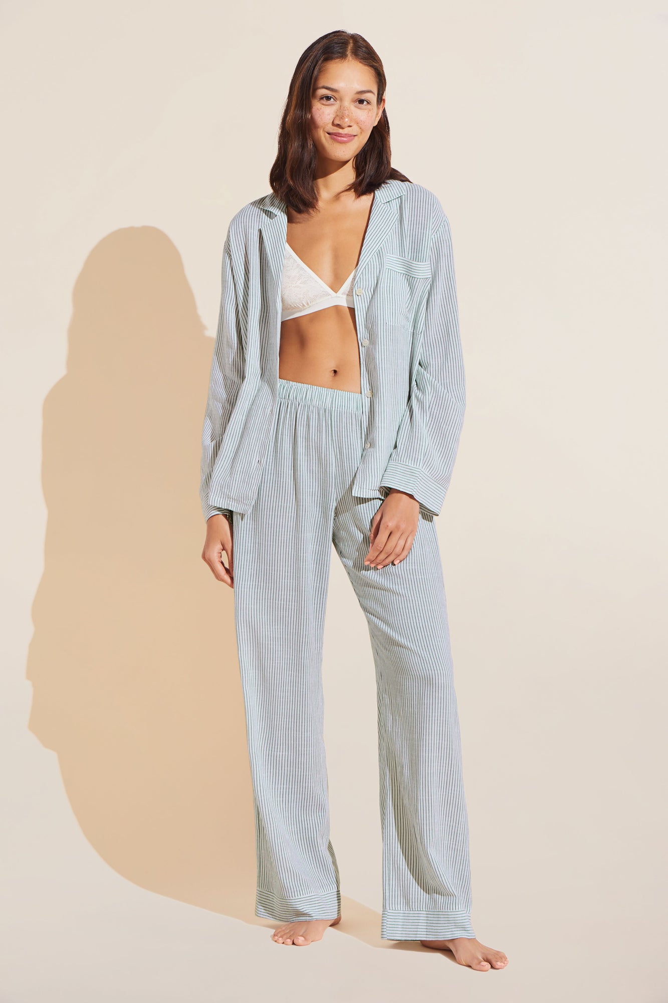 Model wears Nautico Long PJ Set in nautico white and green stripe.