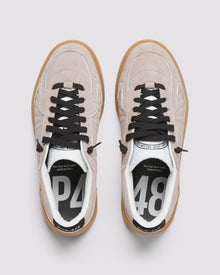 Front angle of light pink and black sneakers