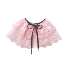 Blush pink lace cape accessory with a black waist bow detail