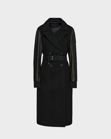 The Rudsak MARYLIN - 8124520 Black womens wool coat has a long double-breasted design, wide collar, belted waist, and leather sleeves, shown on a plain light gray background.