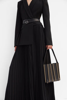 Black wrap blazer midi dress with pleated skirt, belted waist, and long sleeves.