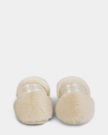The Rudsak FLUFF - L223509 Cream are soft women’s slippers with fluffy faux-fur texture and RUDSAK embroidered on top, shown from the front against a white background—perfect for cozy lounging.