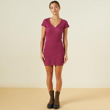 Front view of model wearing the sweater rib mini dress in raspberry rose.