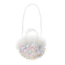 sequin iridescent clutch bag with fur detail along with pearl straps. perfect to pair with any piece from the Ava collection 