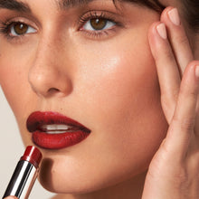 Three lipsticks with silver casings on a white background, featuring the MDSolarSciences brand.