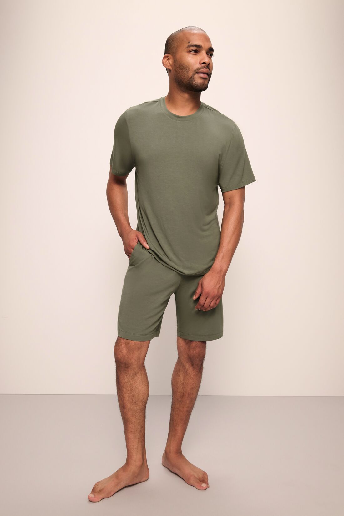 Model wears Henry TENCEL™ Modal Short PJ Set in moss.