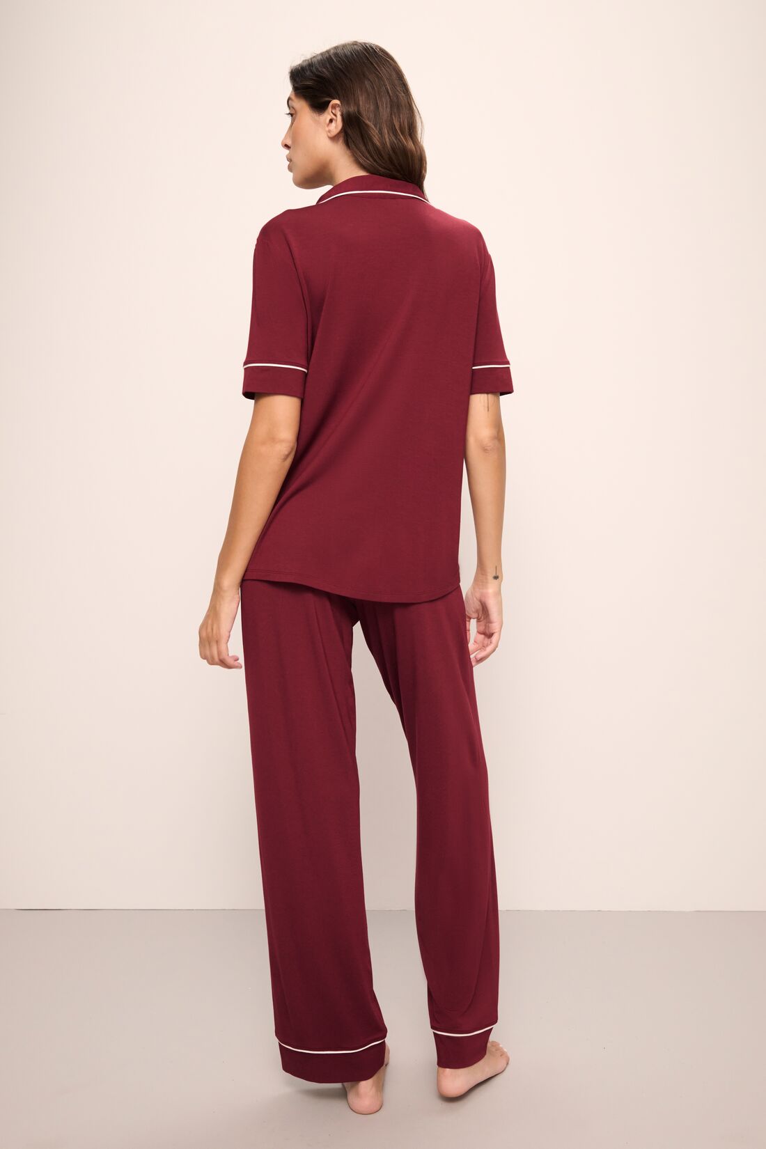 Model wears Gisele TENCEL Modal Short Sleeve & Pant PJ Set in Cabernet/Ivory.