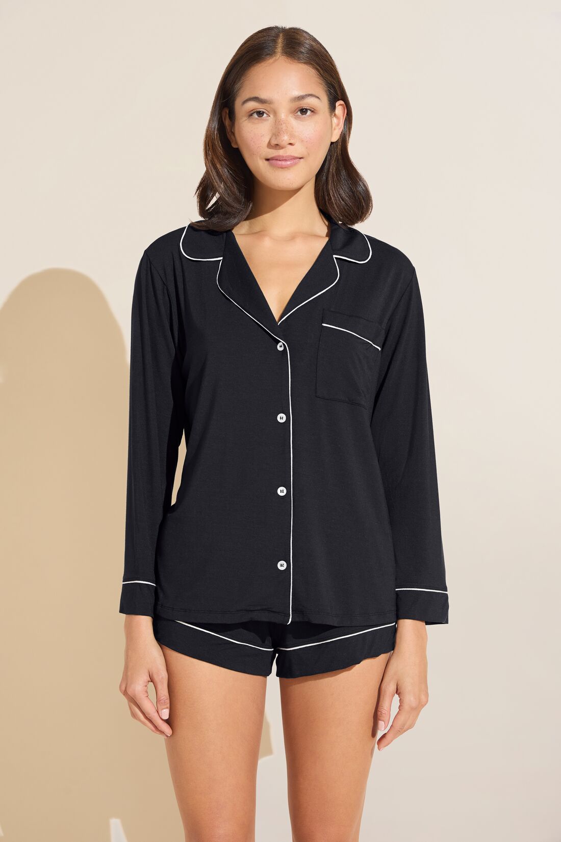 Model wears Gisele TENCELâ„¢ Modal Long Sleeve & Shortie Short PJ Set in black/sorbet pink.