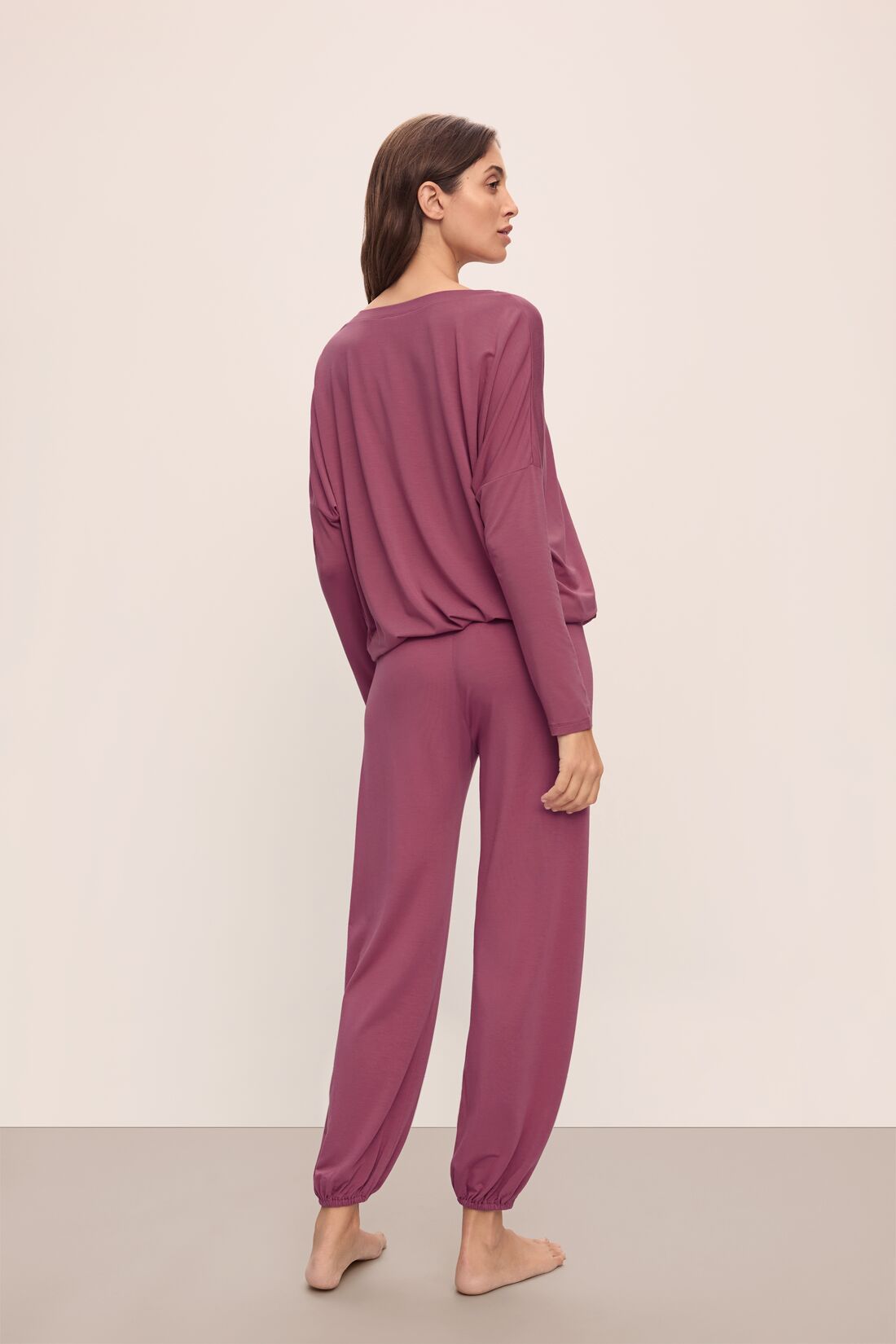Model wears Gisele TENCELâ„¢ Modal Slouchy PJ Set in Raspberry/Ivory.