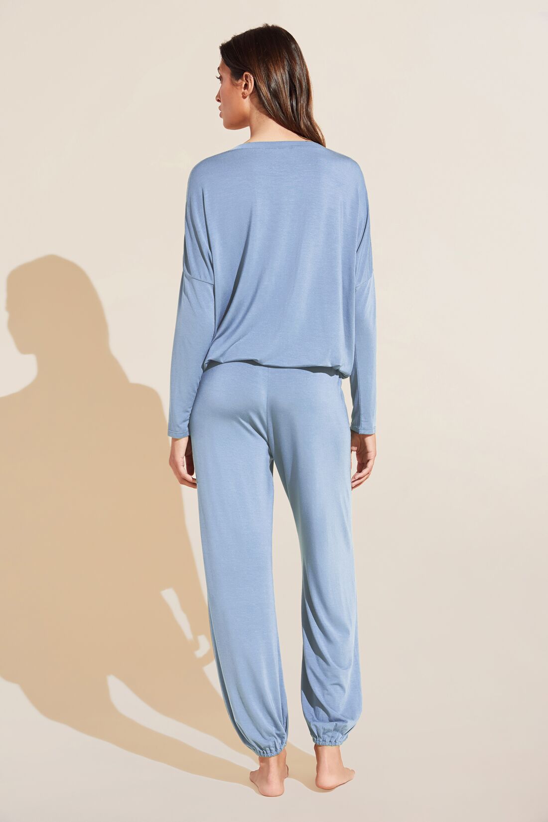 Model wears Gisele TENCELâ„¢ Modal Slouchy PJ Set in wedgewood blue/ivory.