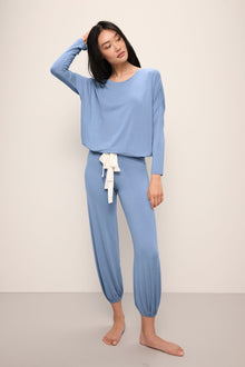 Model wears Gisele TENCELâ„¢ Modal Slouchy PJ Set in wedgewood blue/ivory.