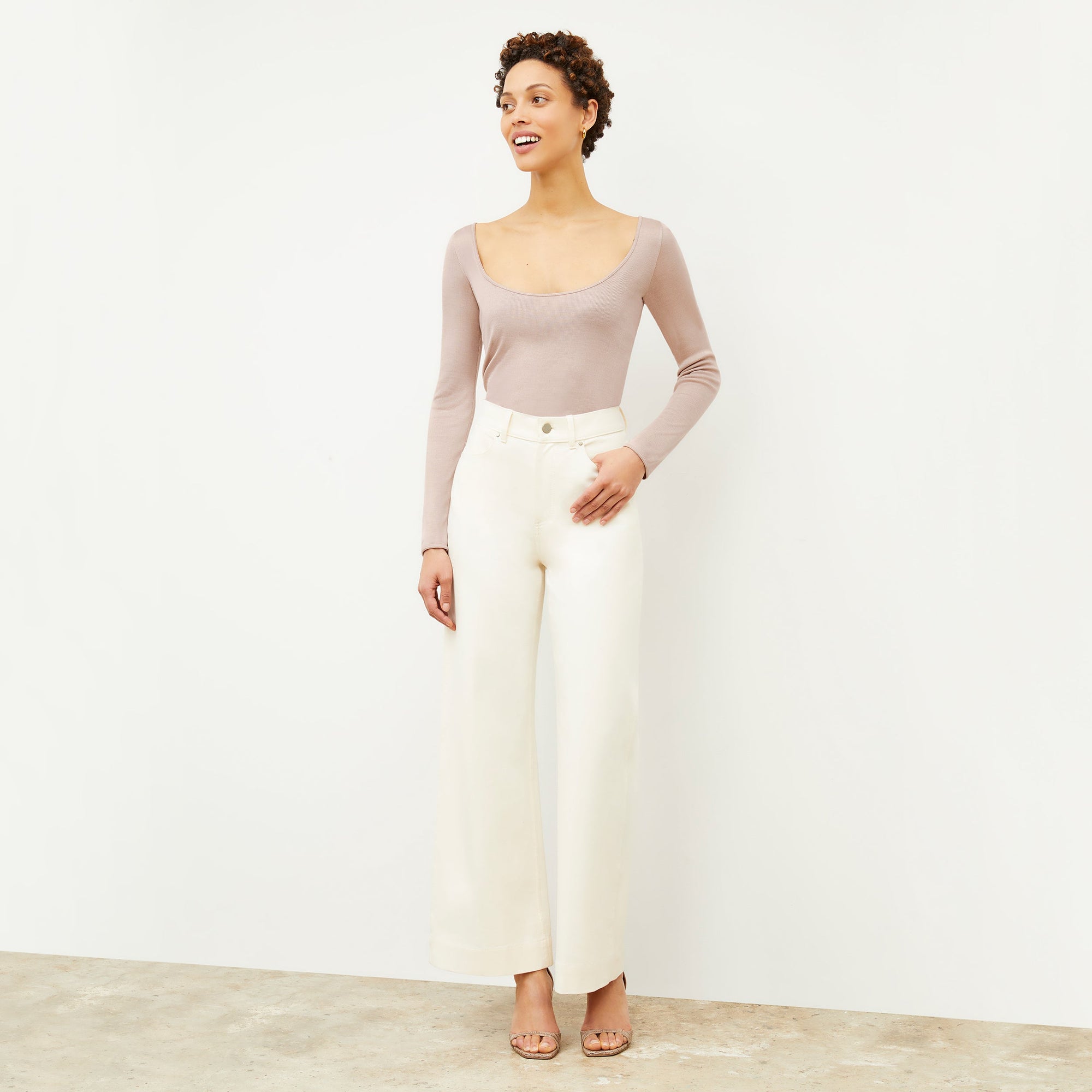 Front image of a woman wearing the Milo Jean in Tusk | Exclude