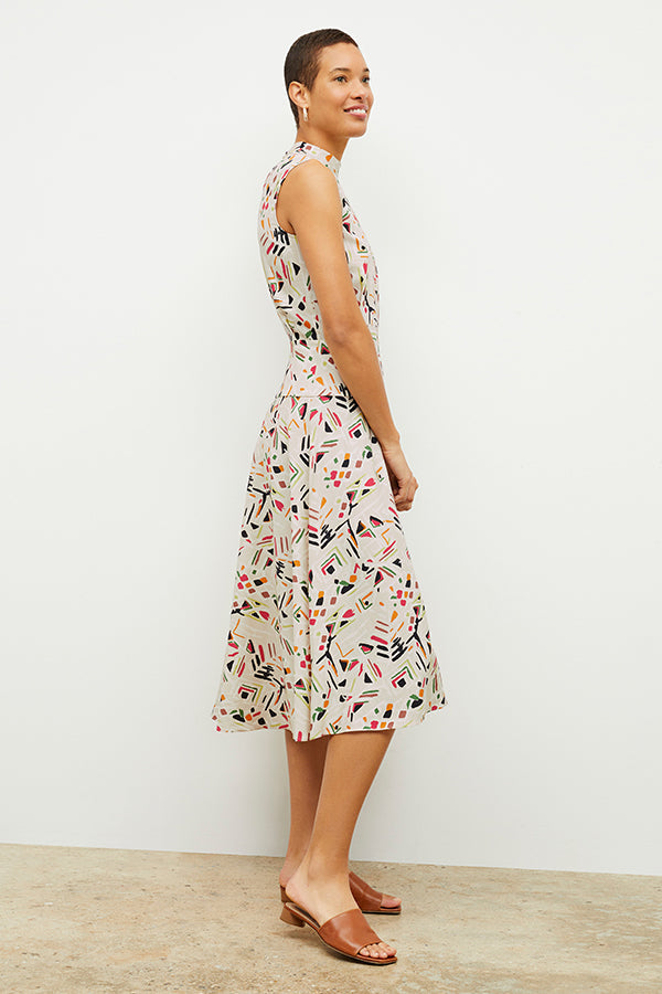 side image of a woman wearing the oona dress in rhythm print | Exclude