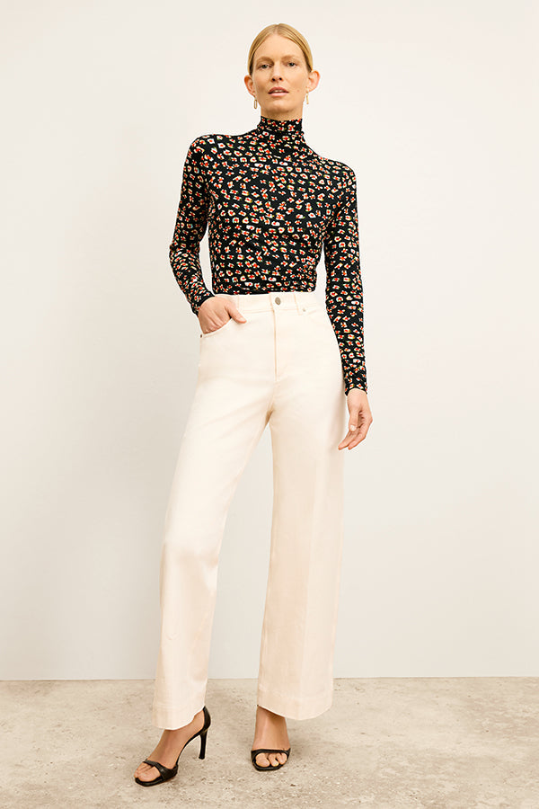 Front image of a woman wearing the Milo Jean in Tusk | Exclude 