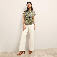 Front image of a woman wearing the Milo Jean in Tusk | Exclude