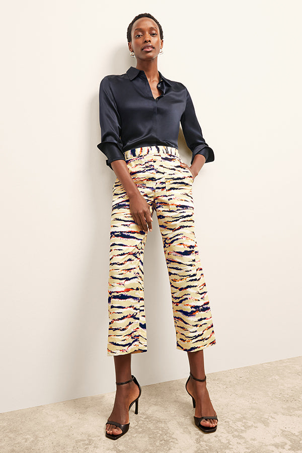 front image of a woman wearing the madelyn pant in savannah print | Exclude | Grid