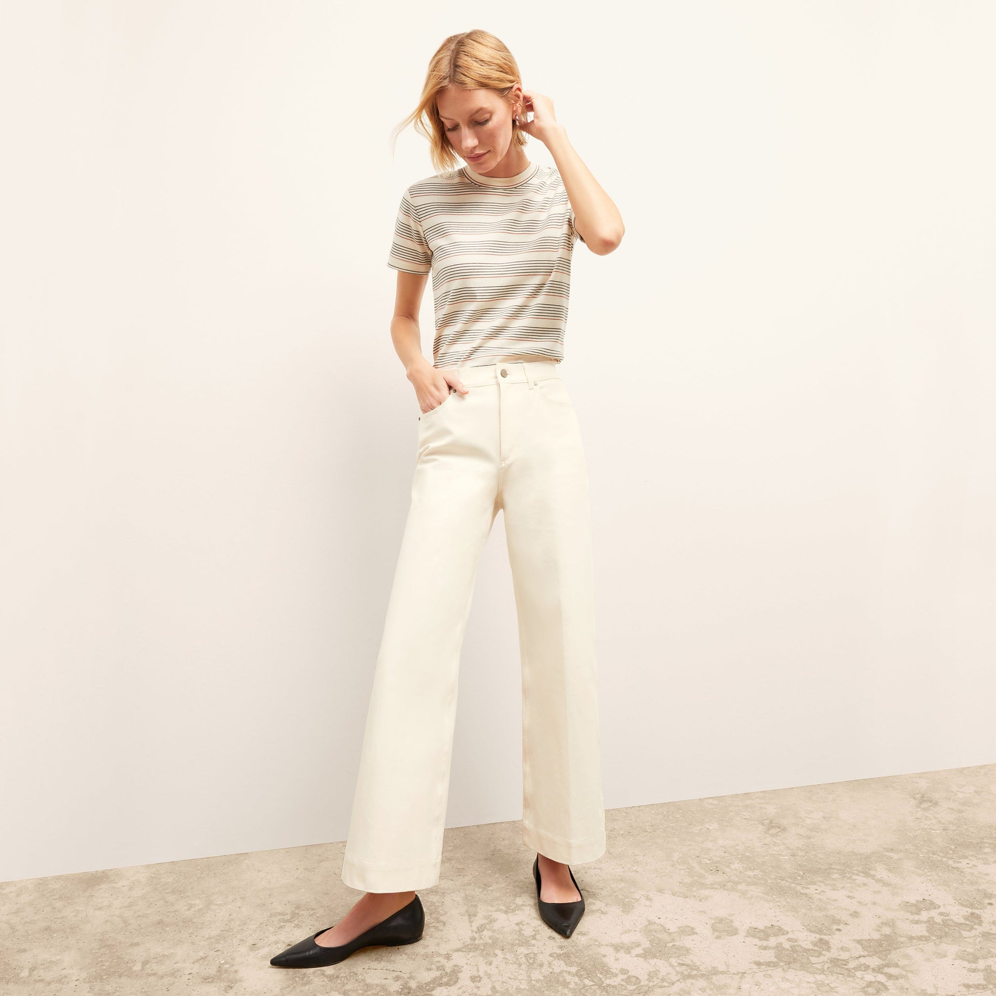 Front image of a woman wearing the Milo Jean in Tusk | Exclude