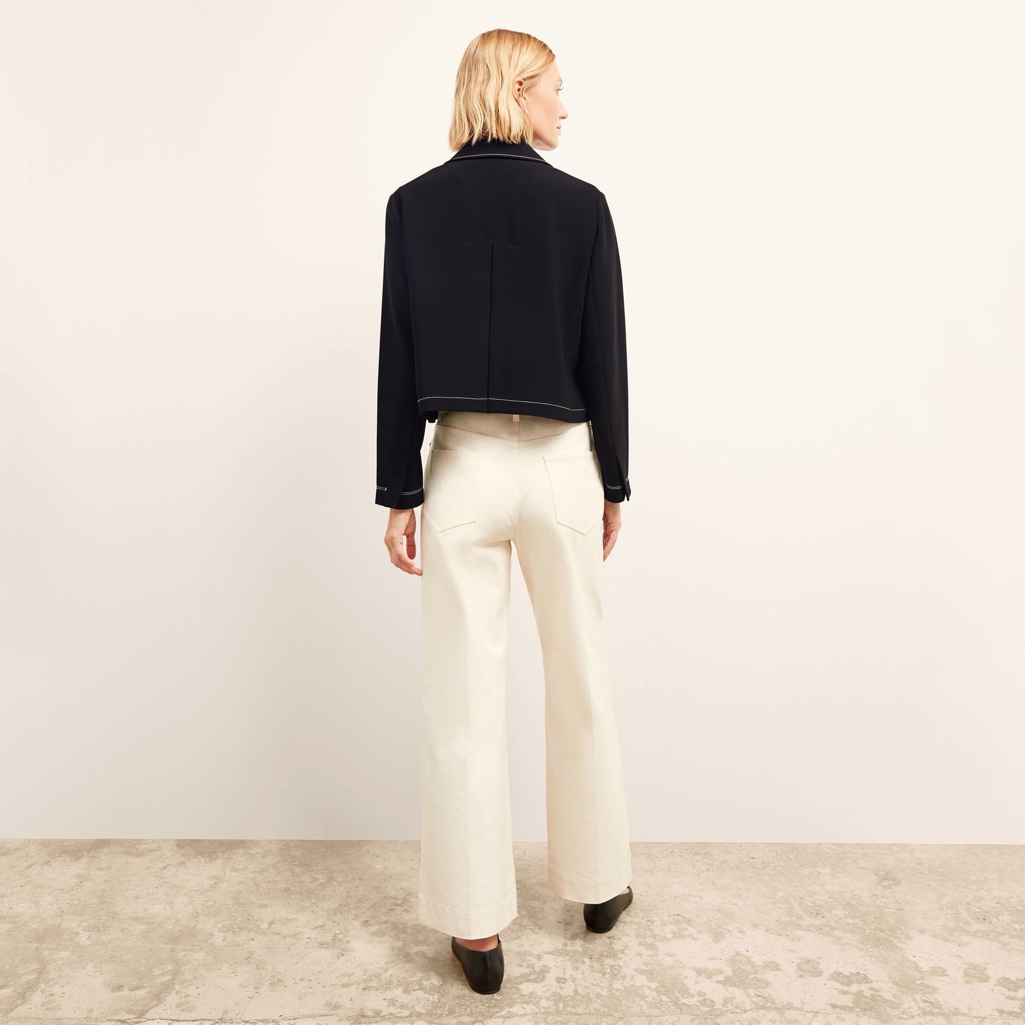 Front image of a woman wearing the Milo Jean in Tusk | Exclude