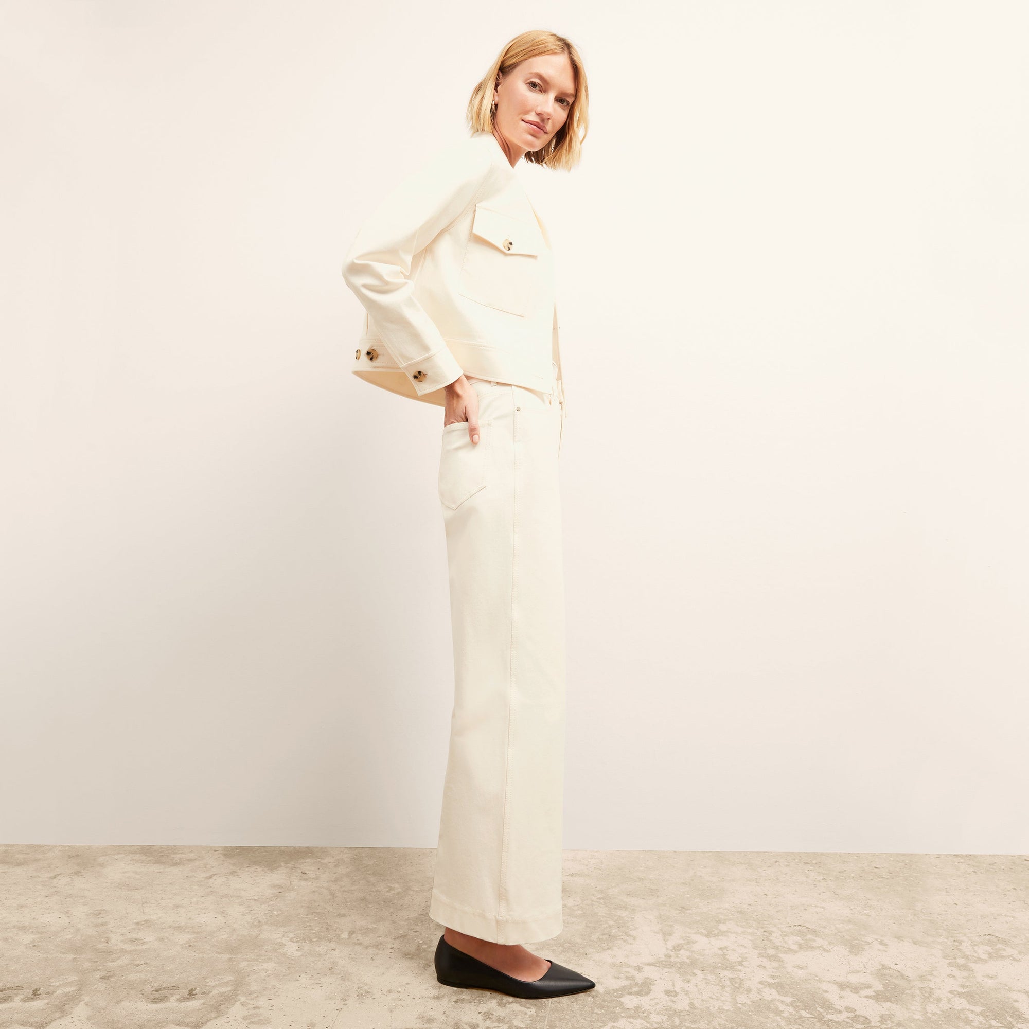 side image of a woman wearing the Milo Jean in Tusk